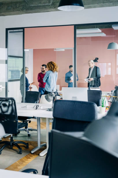 istock Diverse business team in modern office conference room 1342419244