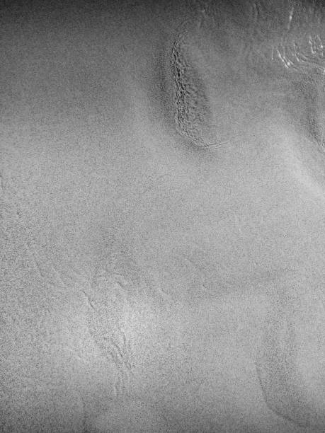 istock Dark water and sand abstract texture - background 1342420343