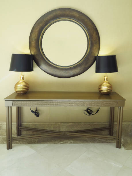 istock Table for dressing, makeup and hairstyles with mirror in modern interior 1342421291