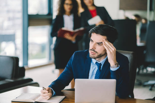 istock Overworked businessman in the office 1342423833