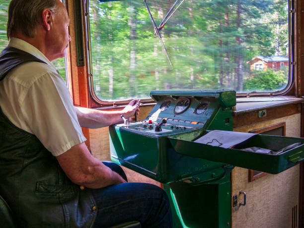 Håverud, Sweden - June 28, 2012: Man driving an old railbus