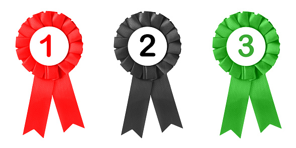 Three medals red black green isolated against white background and place 1 2 3