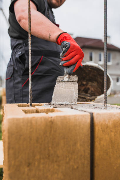 istock Cement-based adhesive for masonry stone block and brick in construction 1342430672
