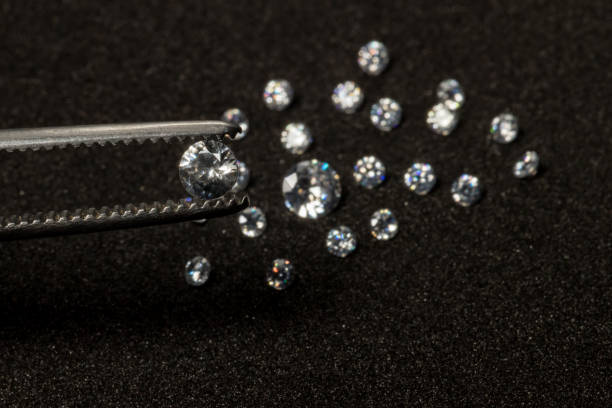 istock Diamonds on black background. Group of diamonds on a Black background. 1342431760