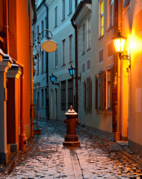istock Narrow medieval street at winter time 1342432907