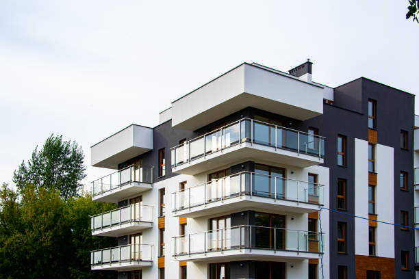 istock modern apartment block, construction site, crane. 1342436044