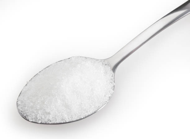 istock Teaspoon of white sugar isolated on white background with clipping path 1342438406