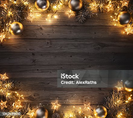istock Christmas and New Year background with fir branches, christmas balls and lights 1342439610