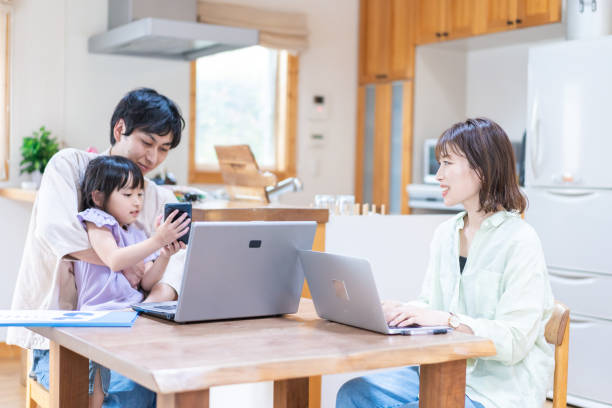 istock A couple and their child teleworking 1342439799