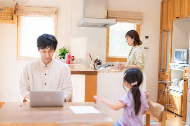 istock A couple and their child teleworking 1342439805