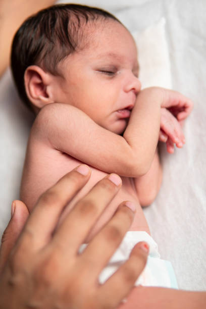 istock High angle close-up image of new born baby sleeping. 1342442837