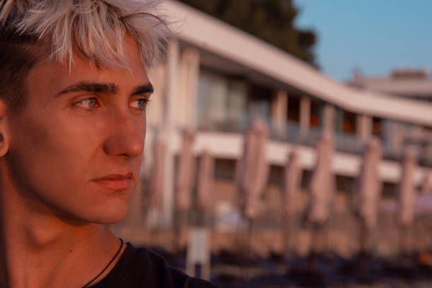 istock Young attractive guy on the pier. 1342443118