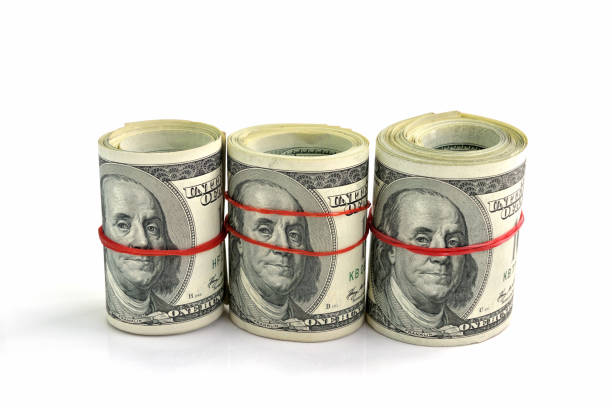 istock American dollars isolated on white background. 1342444612