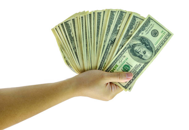 istock American dollars isolated on white background. 1342444684