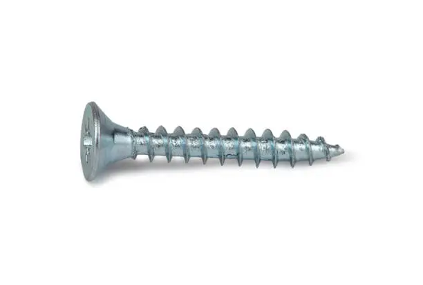 Zinc-plated self-tapping screw with a countersunk head. Isolated on a white background.