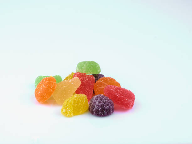 istock Fruit Slice Jelly Candies isolated on white background gummy 1342457465