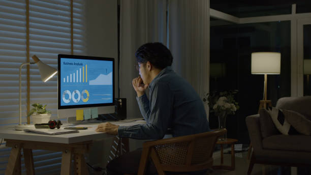 istock Asian man hard working at home,thinking and feeling thoughtful.Working from Home overload at night, self isolation in new normal concept.Working late and Overtime 1342458790