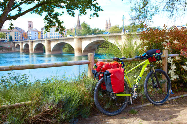 The Way of Saint James biking in Logrono bridge Ebro river at Spain