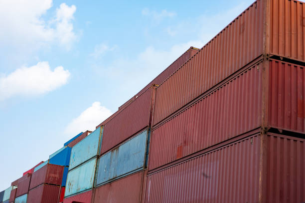 istock Stacked containers under blue sky and white clouds 1342459318