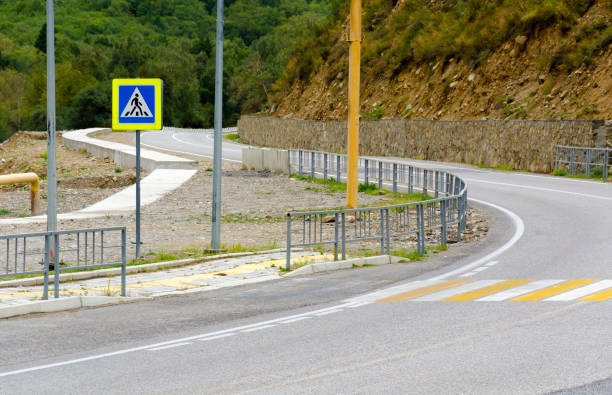 istock asphalt mountain road with a pedestrian crossing at a bend 1342460729