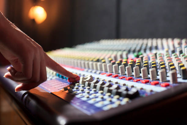istock Hand with sound recording studio mixer 1342463410