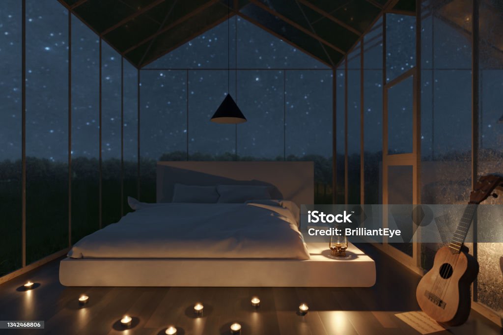 3d rendering of cozy greenhouse with white bed and illuminated candles at night Night Stock Photo