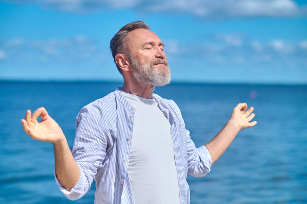 istock Man in gyana mudra pose in nature 1342474051