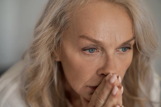 istock Sad worried mature female pondering over something 1342474080