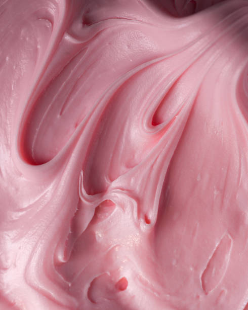 istock Pink icing frosting close up texture 1342474238