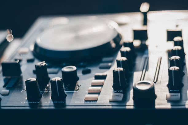 istock DJ mixing console in the sunshine 1342474368