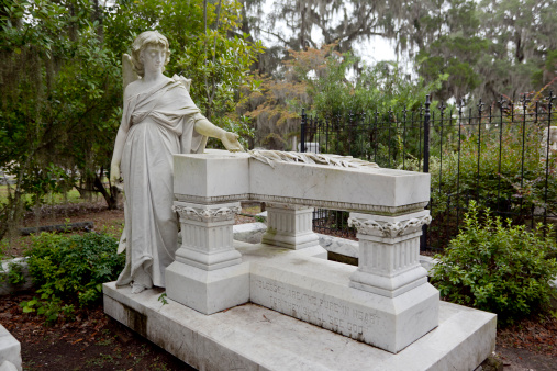 Little Gracie statue in historic Bonaventure Cemetery, Savannah Georgia. The life-size sculpture dates to 1889 and is a well-known Savannah tourist destination.