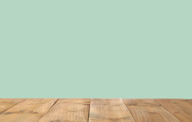 istock Empty wooden surface on mint background. Mockup for design 1342480618