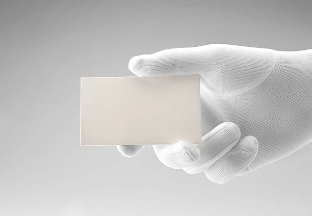 White card/white gloved hand with copy space Formal presentation of white blank card formal glove stock pictures, royalty-free photos & images