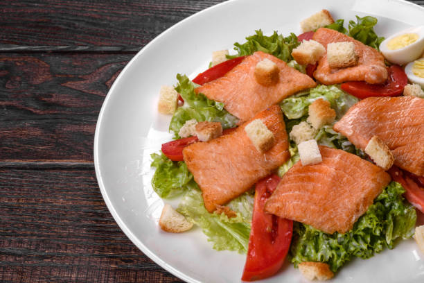 istock Delicious fresh salad with red fish for the festive table 1342484786