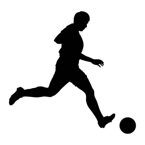 Football (soccer) player shooting silhouette vector art illustration