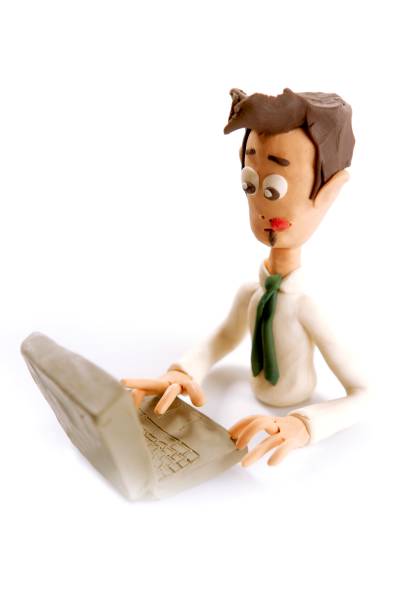 istock Plasticine handmade businessman with laptop 1342490162