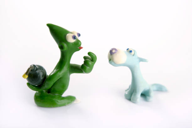 istock joke treason with hidden hand bomb, plasticine 1342490276