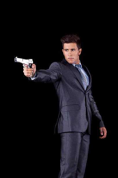 istock Businessman aiming a handgun 134249067