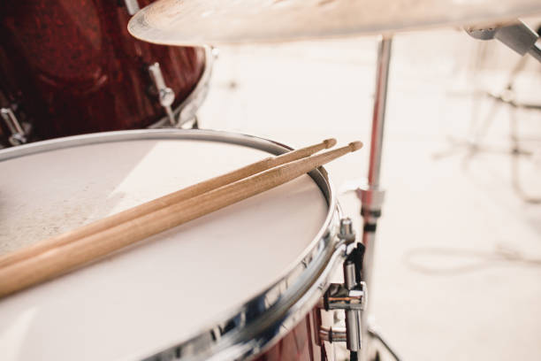 istock Wooden drumsticks on a drum 1342491728
