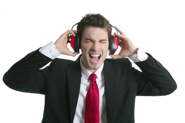 istock businessman headphones noise expression gesture 1342493445