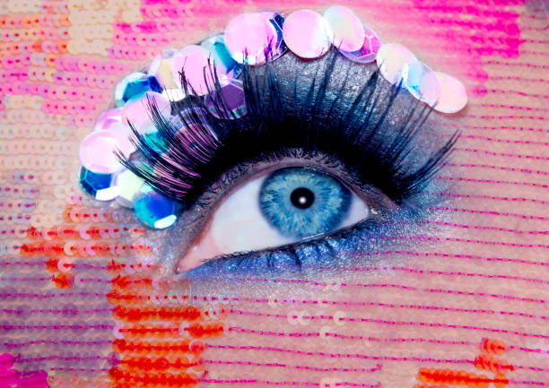 istock Blue eye macro closeup makeup sequins colorful 1342494687