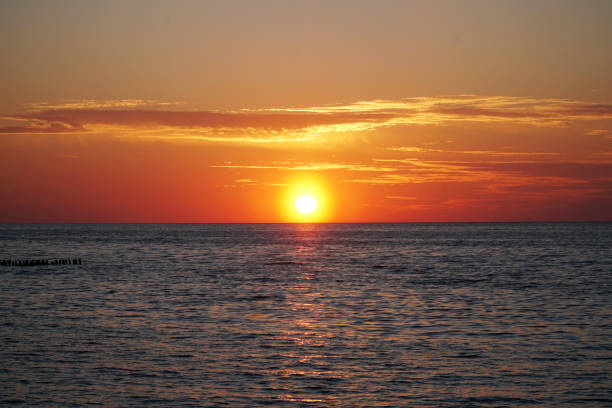 istock sun orange sky sunset bright background 1342495499