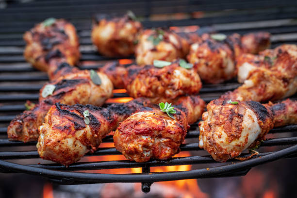 istock Spicy roasted chicken with herbs. Sausage on fire. 1342495637