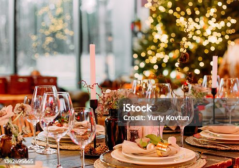 istock festive large table decorated with christmas symbols candles 1342495665