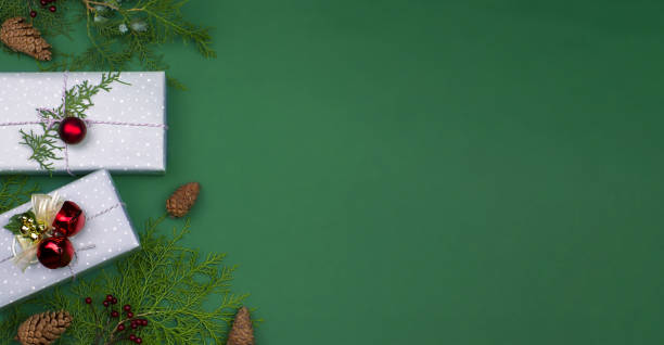 istock Christmas or New Year green background with decor and copy space. 1342495785