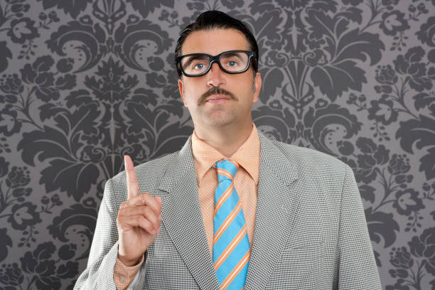istock nerd retro businessman raising finger up hand gesture 1342495920