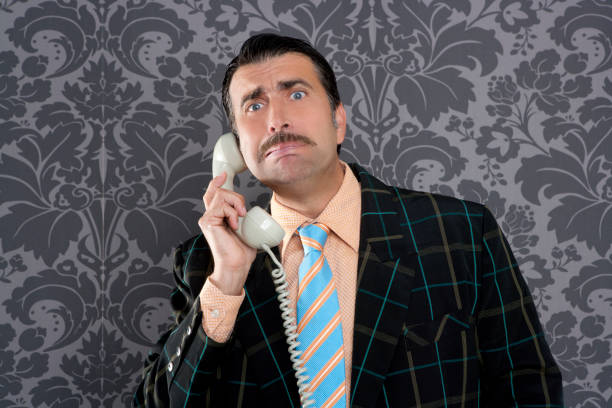 istock Nerd scared expression businessman telephone call 1342497266