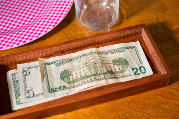 istock Gratuity on table in restaurant/bar. 1342500273