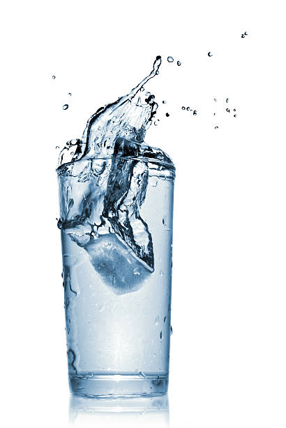 istock water splash in glass isolated on white 134250405