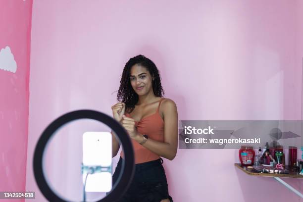 Black Young Woman Filming Herself Dancing At Home To Share On Social Media Stock Photo - Download Image Now